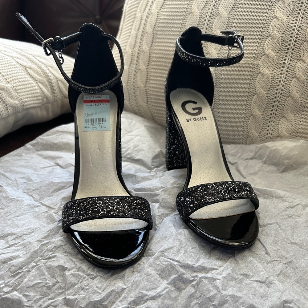 Black silver shimmer heels by Guess.